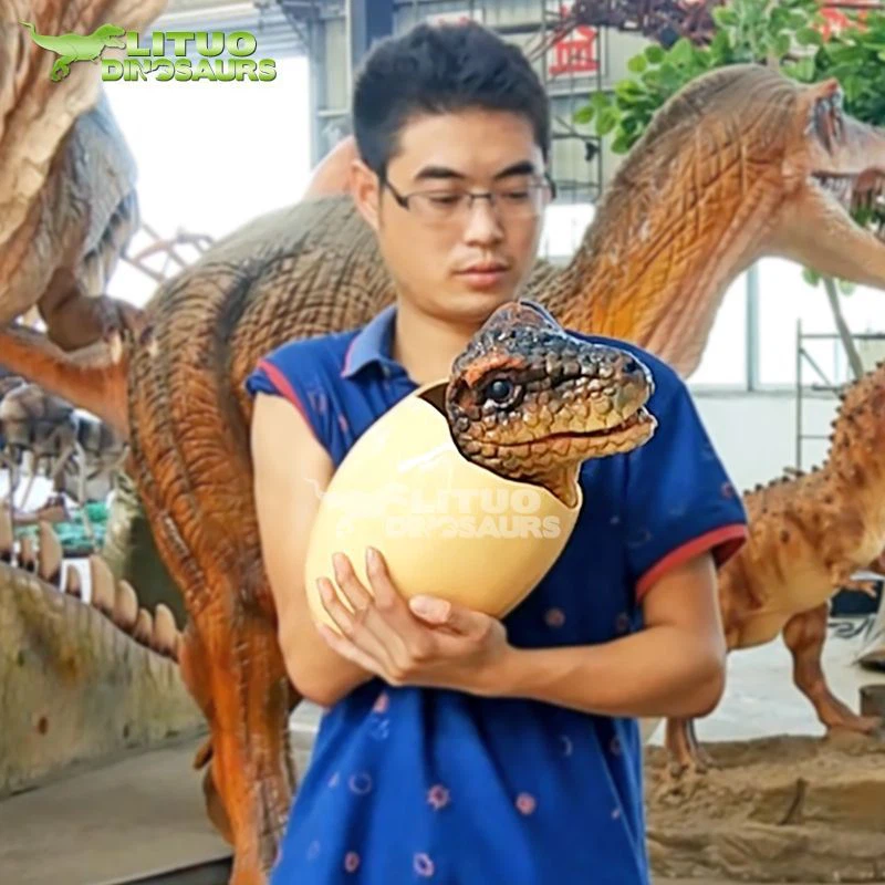 Marioneta de huevo de dinosaurio
